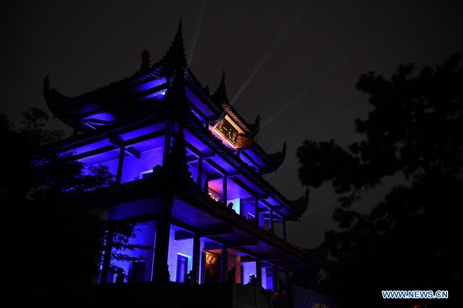 The Tianxin Pavilion is illuminated with blue colored lights to raise awareness about Autism Spectrum Disorder (ASD) in Changsha, capital of central China\'s Hunan Province, April 2, 2019, the World Autism Awareness Day. World Autism Awareness Day on April 2 every year is designated to encourage member states of the United Nations to take measures to raise awareness about people with ASD throughout the world. (Xinhua/Xue Yuge)