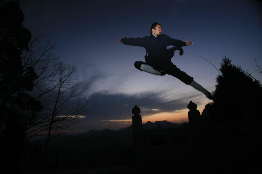 About 20 Chinese martial arts schools in the Wudang Mountain region have trained about 30,000 kung fu enthusiasts from around the world. (Photo provided to chinadaily.com.cn)