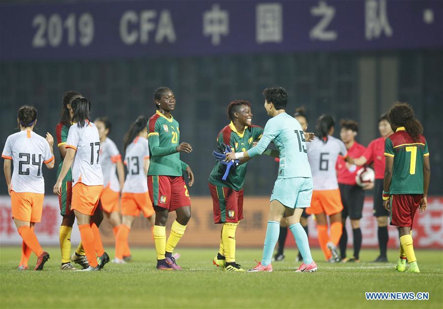China\'s goalkeeper Bi Xiaolin (front R) greets Cameroon\'s Christine Manie (C front) after the final match between China and Cameroon at the 2019 International Women\'s Football Tournament in Wuhan, central China\'s Hubei Province, April 7, 2019. China won 1-0. (Xinhua/Ding Xu)