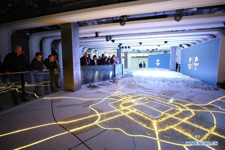 Photo taken on April 8, 2019 shows representatives from major world news agencies in an exhibition center at the Organzing committee during a venue visit prior to the First World Agency Meeting of Beijing 2022, in Beijing, capital of China. Representatives from major world news agencies are visiting Beijing for a first look at some of the facilities to be used at the 2022 Winter Olympic Games. (Xinhua/Xu Zijian)