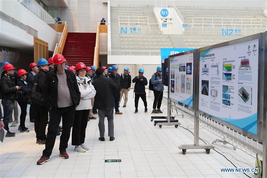 Photo taken on April 8, 2019 shows representatives from major world news agencies in the National Aquatics Center during a venue visit prior to the First World Agency Meeting of Beijing 2022, in Beijing, capital of China. Representatives from major world news agencies are visiting Beijing for a first look at some of the facilities to be used at the 2022 Winter Olympic Games. (Xinhua/Xu Zijian)