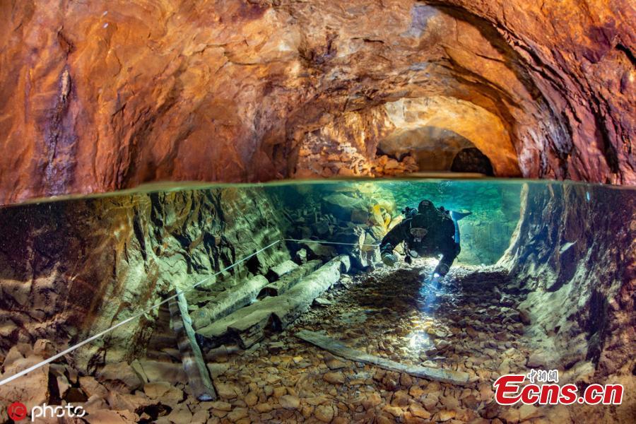 Photographer Martin Strmiska dived the Slovak Opal Mines, which has many tunnels, shafts and adits excavated in the volcanic hills. Five lowest levels are flooded, offering an incredible experience when diving in completely crystal clear water.(Photo/IC)