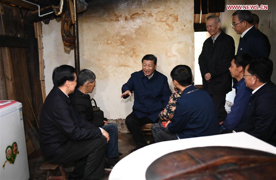 Chinese President Xi Jinping, also general secretary of the Communist Party of China Central Committee and chairman of the Central Military Commission, visits a villager\'s home to learn about the progress of poverty alleviation and in solving prominent problems including meeting the basic need of food and clothing and guaranteeing compulsory education, basic medical care and safe housing, in Huaxi Village of Shizhu Tujia Autonomous County, southwest China\'s Chongqing, April 15, 2019. Xi went on an inspection tour in southwest China\'s Chongqing Municipality Monday. (Xinhua/Xie Huanchi)