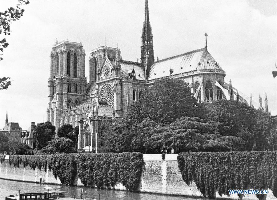 File photo taken in 1979 shows the Notre Dame Cathedral in Paris, France. The devastating fire at Notre Dame Cathedral in central Paris has been put out after burning for 15 hours, local media reported on April 16, 2019. In early evening on April 15, a fire broke out in the famed cathedral. Online footage showed thick smoke billowing from the top of the cathedral and huge flames between its two bell towers engulfing the spire and the entire roof which both collapsed later. Notre Dame is considered one of the finest examples of French Gothic architecture which receives about 12 million visitors every year. (Xinhua)