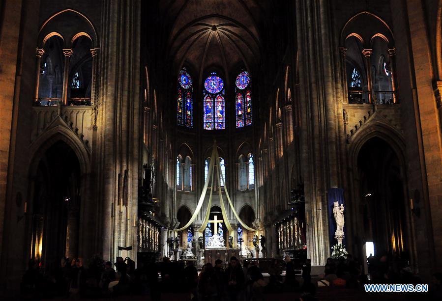File photo taken on Oct. 11, 2013 shows the interior of the Notre Dame Cathedral in Paris, France. The devastating fire at Notre Dame Cathedral in central Paris has been put out after burning for 15 hours, local media reported on April 16, 2019. In early evening on April 15, a fire broke out in the famed cathedral. Online footage showed thick smoke billowing from the top of the cathedral and huge flames between its two bell towers engulfing the spire and the entire roof which both collapsed later. Notre Dame is considered one of the finest examples of French Gothic architecture which receives about 12 million visitors every year. (Xinhua/Liu Xiao)