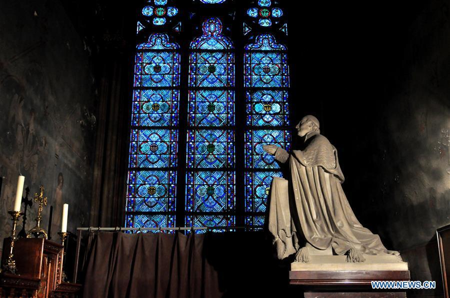 File photo taken on Oct. 11, 2013 shows exterior sculptures of the Notre Dame Cathedral in Paris, France. The devastating fire at Notre Dame Cathedral in central Paris has been put out after burning for 15 hours, local media reported on April 16, 2019. In early evening on April 15, a fire broke out in the famed cathedral. Online footage showed thick smoke billowing from the top of the cathedral and huge flames between its two bell towers engulfing the spire and the entire roof which both collapsed later. Notre Dame is considered one of the finest examples of French Gothic architecture which receives about 12 million visitors every year. (Xinhua/Liu Xiao)