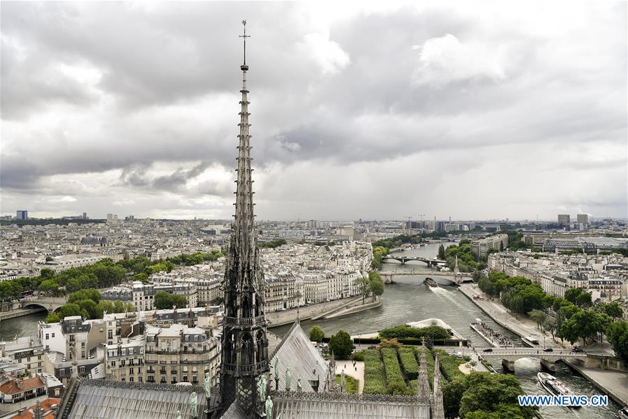 File photo taken on June 30, 2017 shows the spire of the Notre Dame Cathedral in Paris, France. The devastating fire at Notre Dame Cathedral in central Paris has been put out after burning for 15 hours, local media reported on April 16, 2019. In early evening on April 15, a fire broke out in the famed cathedral. Online footage showed thick smoke billowing from the top of the cathedral and huge flames between its two bell towers engulfing the spire and the entire roof which both collapsed later. Notre Dame is considered one of the finest examples of French Gothic architecture which receives about 12 million visitors every year. (Xinhua/Chen Yichen)