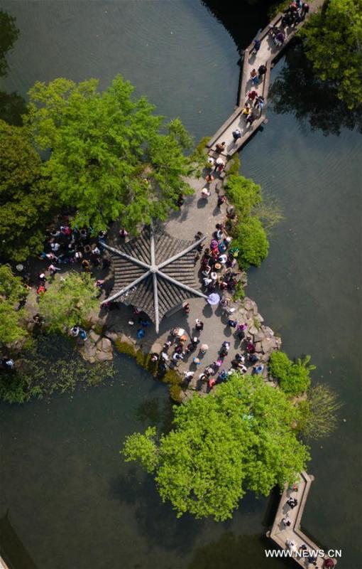 Aerial photo taken on April 17, 2019 shows the scenery of Humble Administrator\'s Garden in Suzhou, east China\'s Jiangsu Province. Suzhou is home to dozens of famous classical gardens that have inventive and exquisite design and oriental aesthetics. Nowadays more than 60 of them are still in existence, among which the Humble Administrator\'s Garden, Lingering Garden and the Lion Grove Garden are on the UNESCO\'s World Heritage List. (Xinhua/Li Xiang)