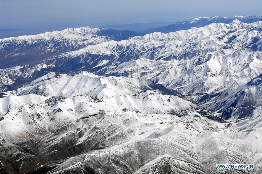 Aerial photo taken on April 21, 2019 shows the snow scenery of Qilian Mountains in northwest China. (Xinhua/Fan Peishen)
