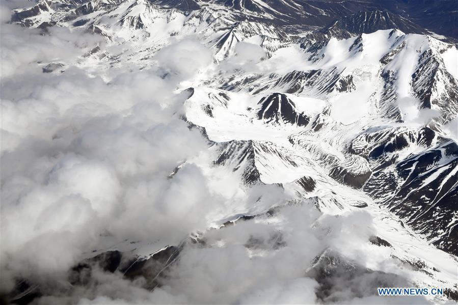 Aerial photo taken on April 21, 2019 shows the snow scenery of Qilian Mountains in northwest China. (Xinhua/Fan Peishen)