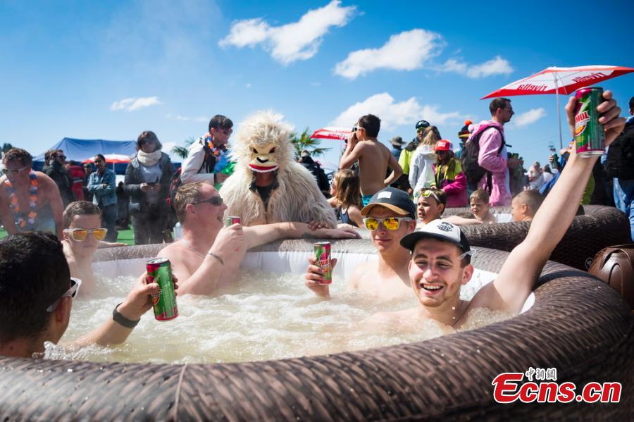 People have fun in a jacuzzi pool at the \