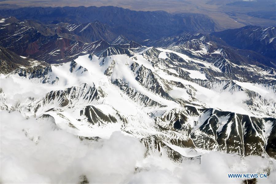 Aerial photo taken on April 21, 2019 shows the snow scenery of Qilian Mountains in northwest China. (Xinhua/Fan Peishen)
