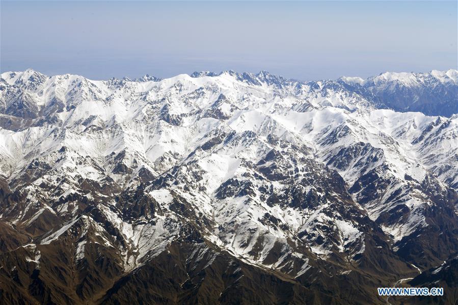Aerial photo taken on April 21, 2019 shows the snow scenery of Qilian Mountains in northwest China. (Xinhua/Fan Peishen)