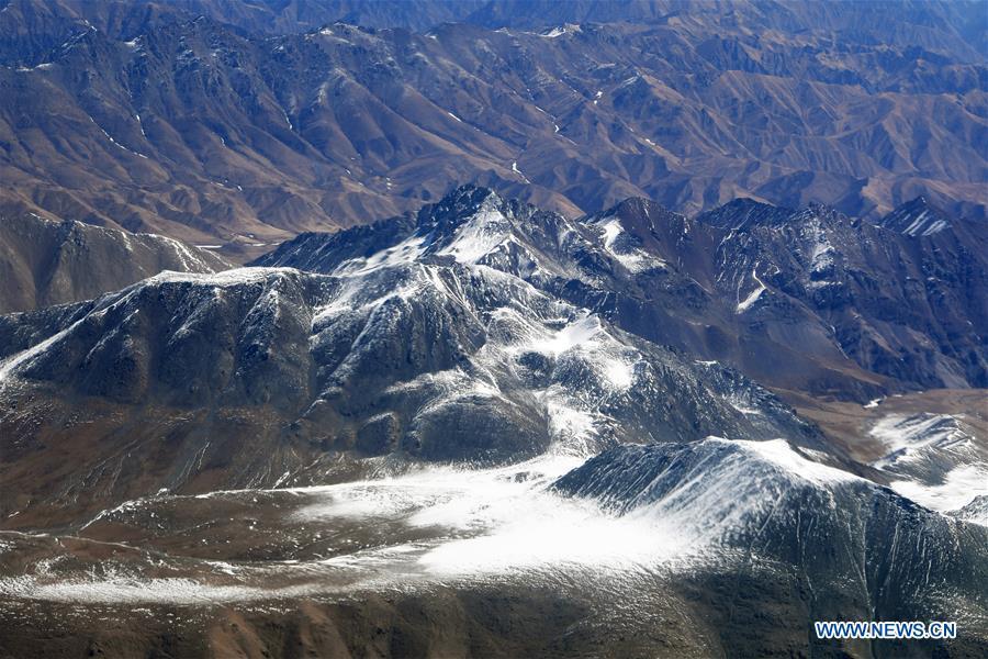 Aerial photo taken on April 21, 2019 shows the snow scenery of Qilian Mountains in northwest China. (Xinhua/Fan Peishen)