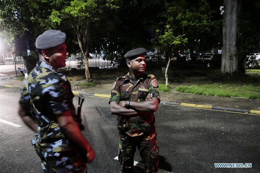 Soldiers stand guard at the Bandaranaike International Airport in Colombo, Sri Lanka, April 22, 2019. The death toll from the multiple blasts that ripped through Sri Lanka on Sunday rose to 228 while 450 others were injured, local media quoting hospital sources said. (Xinhua/Wang Shen)