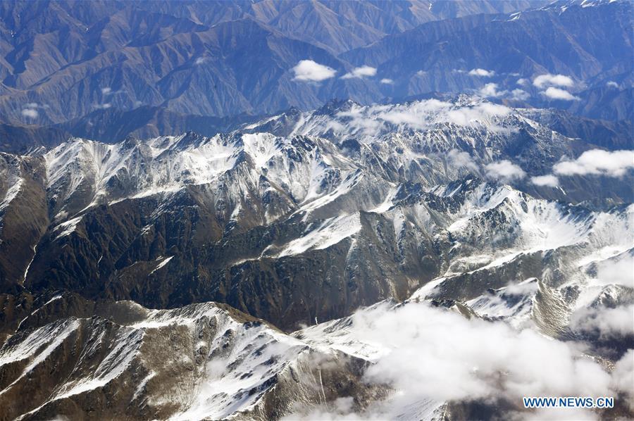 Aerial photo taken on April 21, 2019 shows the snow scenery of Qilian Mountains in northwest China. (Xinhua/Fan Peishen)