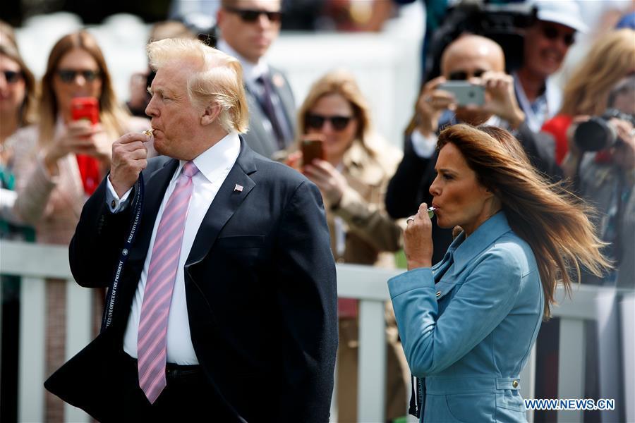 U.S. President Donald Trump (front L) and First Lady Melania Trump (front R) attend the annual Easter Egg Roll at the White House in Washington D.C., the United States, on April 22, 2019. White House Easter Egg Roll was held on the South Lawn on Monday as the annual tradition entered its 141st year. (Xinhua/Ting Shen)