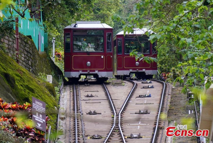 A view of Hong Kong\'s Peak Tram, one of the world\'s oldest and most famous funicular railways, April 22, 2019. A project to upgrade the tram will involve a significant investment of HK$684 million, replacing the current tram cars, which have a capacity of 120 passengers, with new 210-passenger tram cars. The first suspension of the Peak Tram service will begin on April 23 and last approximately two to three months. (Photo: China News Service/Zhang Wei)