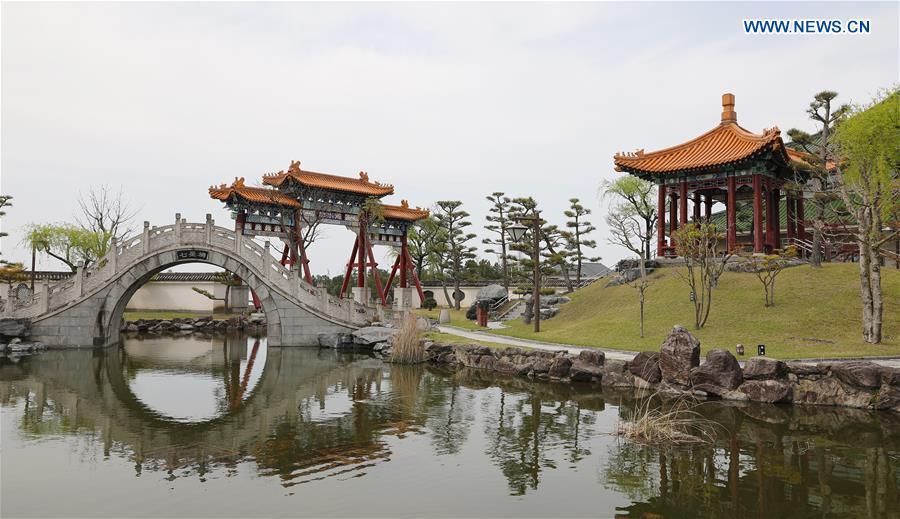Photo taken on April 18, 2019 shows a view at the Encho-en garden in Tottori, Japan. Covering an area of about 10,000 square meters, Encho-en is one of the biggest full-scaled Chinese-style garden in Japan. It was built in 1995 to show the friendship between Tottori and north China\'s Hebei Province. The designing and materials procurement and processing took place in China. The main building was shop-assembled in China before the final assembly in Japan. All these steps were supervised by Chinese engineers. (Xinhua/Du Xiaoyi)