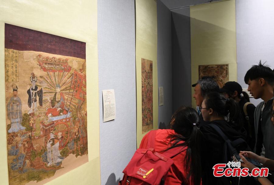 An exhibition featuring over 90 replicas of relics from Mogao Grottoes is underway at Northwest Normal University in Lanzhou City, Northwest China\'s Gansu Province, April 23, 2019. The life-size replicas are based on original murals or paintings from Mogao Grottoes, which are now collected in museums in the UK, France, the U.S., and Japan.  (Photo: China News Service/Yang Yanmin)