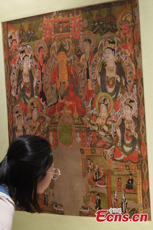 An exhibition featuring over 90 replicas of relics from Mogao Grottoes is underway at Northwest Normal University in Lanzhou City, Northwest China\'s Gansu Province, April 23, 2019. The life-size replicas are based on original murals or paintings from Mogao Grottoes, which are now collected in museums in the UK, France, the U.S., and Japan.  (Photo: China News Service/Yang Yanmin)