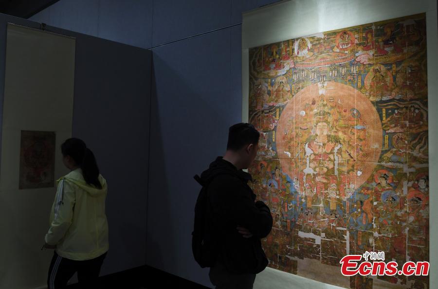 An exhibition featuring over 90 replicas of relics from Mogao Grottoes is underway at Northwest Normal University in Lanzhou City, Northwest China\'s Gansu Province, April 23, 2019. The life-size replicas are based on original murals or paintings from Mogao Grottoes, which are now collected in museums in the UK, France, the U.S., and Japan.  (Photo: China News Service/Yang Yanmin)