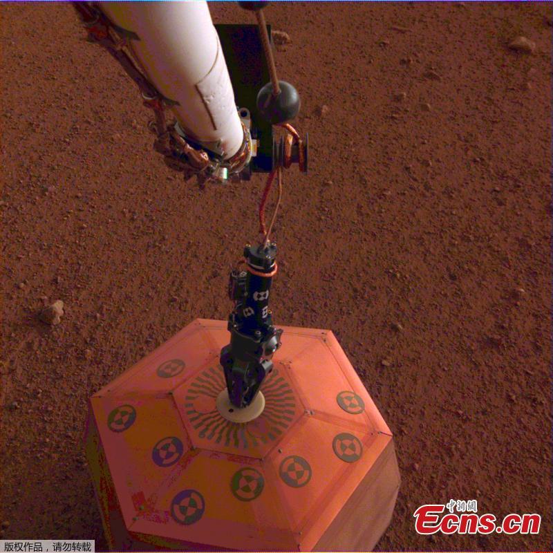 NASA\'s InSight lander set its heat probe, called the Heat and Physical Properties Package (HP3), on the Martian surface on Feb. 12, 2019.  (Photo/NASA)