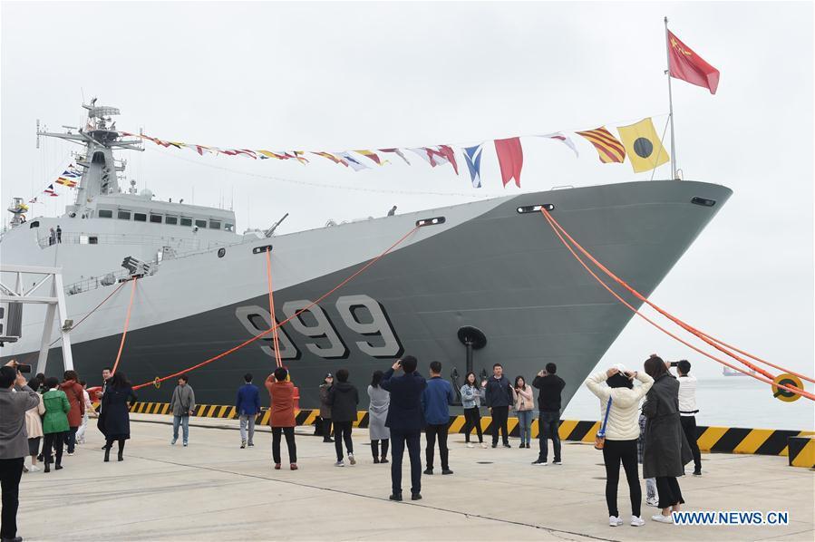 Visitors take photos during a warship open day event in Qingdao, east China\'s Shandong Province, April 24, 2019. A warship open day event was held on Wednesday in Qingdao, as part the multinational naval events marking the 70th founding anniversary of PLA Navy. (Xinhua/Luo Xiaoguang)