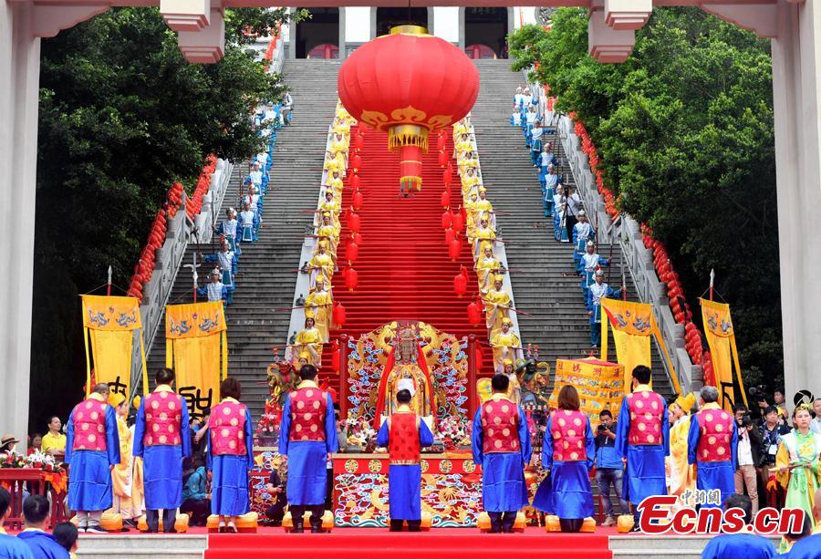 Thousands of people gather for a grand worship ceremony marking the 1,059th birthday of sea goddess Mazu on Meizhou Island in Putian City, East China\'s Fujian Province, April 27, 2019. Mazu is the deified form of Lin Mo, a shaman who lived in the 10th century on Meizhou Island. Revered after her death as a patron of seafarers, including fishermen and sailors, her worship spread throughout China\'s coastal regions and Chinese communities throughout Southeast Asia.  (Photo: China News Service/Lyu Ming)