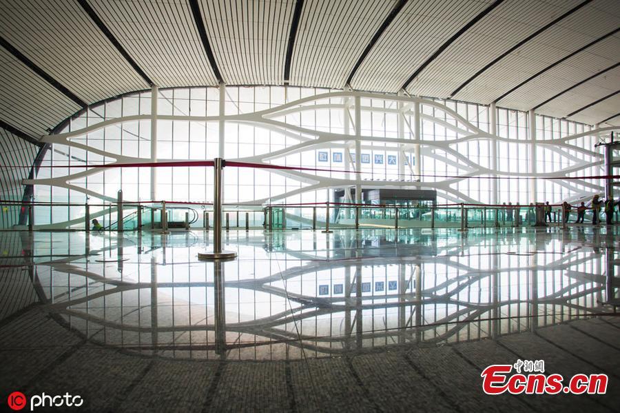 Photo taken on April 26, 2019 shows a view of the inside of the Beijing Daxing International Airport, which will begin operations before the end of September. The new airport sits at the junction of Beijing\'s southern Daxing District and Langfang, a city in Hebei Province. It is expected to handle 45 million passengers annually by 2021 and 72 million by 2025. (Photo/IC)