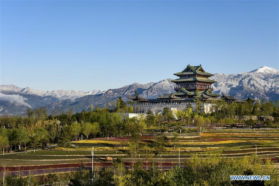 Photo taken on April 25, 2019 shows the Yongning Pavilion at the International Horticultural Exhibition 2019 Beijing in Yanqing District of Beijing, capital of China. The International Horticultural Exhibition 2019 Beijing, the largest expo of its kind in the world, opened to the public Monday in Yanqing District. Yanqing boasts itself as being home to parts of the Great Wall. It is a summer resort and the agricultural base of Beijing. The upgrading of infrastructure and the acceleration of the horticulture industry because of the expo can further stimulate the development of tourism in Yanqing. (Xinhua/Liu Guifu)