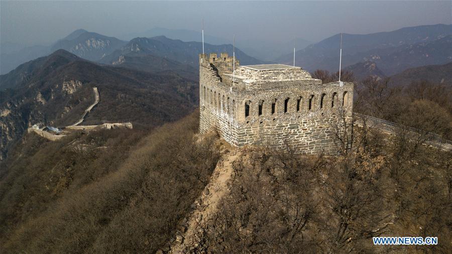 Aerial photo taken on March 18, 2019 shows Jiuyanlou Great Wall in Yanqing District of Beijing, capital of China. The International Horticultural Exhibition 2019 Beijing, the largest expo of its kind in the world, opened to the public Monday in Yanqing District. Yanqing boasts itself as being home to parts of the Great Wall. It is a summer resort and the agricultural base of Beijing. The upgrading of infrastructure and the acceleration of the horticulture industry because of the expo can further stimulate the development of tourism in Yanqing. (Xinhua/Ju Huanzong)