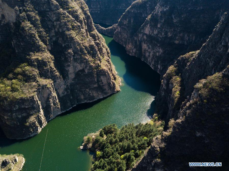 Aerial photo taken on April 30, 2019 shows the scenery of Longqing Gorge in Yanqing District of Beijing, capital of China. The International Horticultural Exhibition 2019 Beijing, the largest expo of its kind in the world, opened to the public Monday in Yanqing District. Yanqing boasts itself as being home to parts of the Great Wall. It is a summer resort and the agricultural base of Beijing. The upgrading of infrastructure and the acceleration of the horticulture industry because of the expo can further stimulate the development of tourism in Yanqing. (Xinhua/Ju Huanzong)