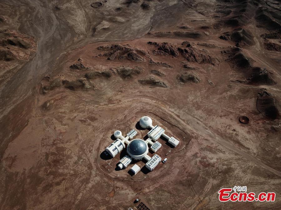 A picture taken with a drone shows an aerial view of the C-Space Project, a Mars simulation base in the Gobi Desert in Jinchang, Gansu Province, China. The C-Space Project Mars Base opened officially on 17 April 2019 with the aim to educate and provide an environment for youths and tourists to experience life on planet Mars. The base occupying an area of 11,996 square feet is situated about 40 kilometers from the town of Jinchang in the Gobi Desert. The location is chosen to simulate the landscape and harsh conditions of living on Mars as much as possible. (Photo/China News Service)