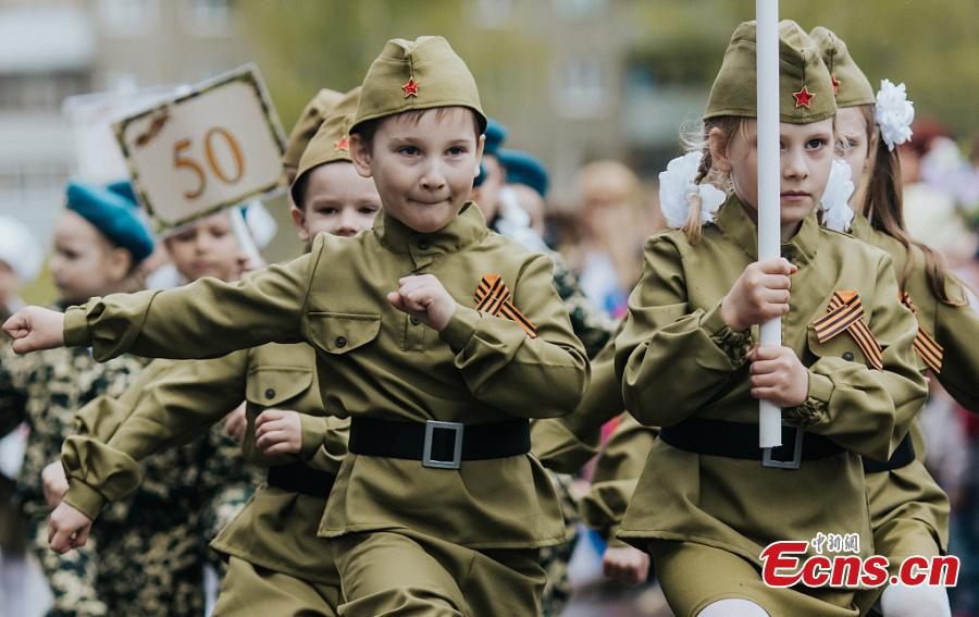 Children marched through the streets in military uniforms during a parade to celebrate the upcoming 74th Victory Day in Ivanovo, Russia, May 7, 2019. (Photo/VCG)