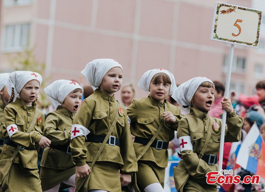 Children marched through the streets in military uniforms during a parade to celebrate the upcoming 74th Victory Day in Ivanovo, Russia, May 7, 2019. (Photo/VCG)