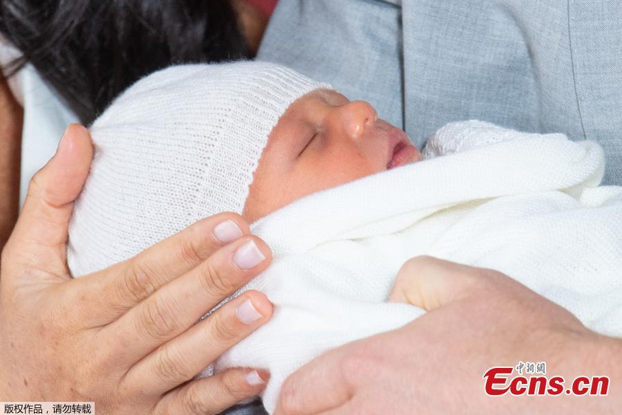 Photo taken on May 8, 2019 shows the son of Britain\'s Prince Harry, Duke of Sussex, and his wife Meghan Markle, Duchess of Sussex, in St George\'s Hall at Windsor Castle in Windsor, Britain. The baby boy, who is Queen Elizabeth\'s eighth great-grandchild, is seventh in line to the throne, behind the Prince of Wales, the Duke of Cambridge and his children - Prince George, Princess Charlotte and Prince Louis - and Prince Harry.