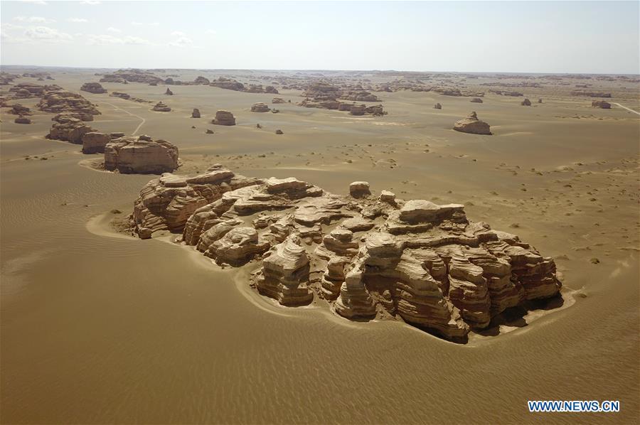 Aerial photo taken on May 8, 2019 shows the scenery of Dunhuang Yardang National Geopark after a rain in Dunhuang, northwest China\'s Gansu Province. (Xinhua/Fan Peishen)