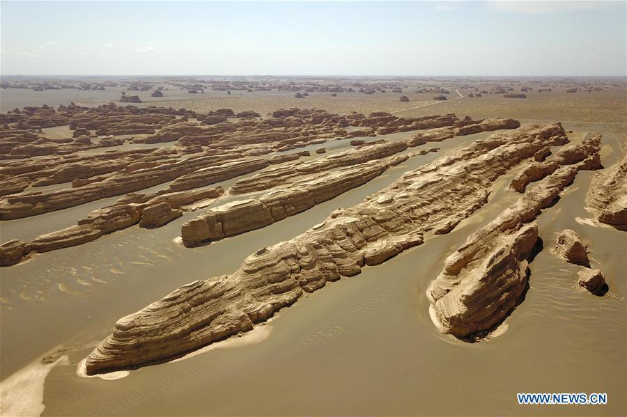 Aerial photo taken on May 8, 2019 shows the scenery of Dunhuang Yardang National Geopark after a rain in Dunhuang, northwest China\'s Gansu Province. (Xinhua/Fan Peishen)