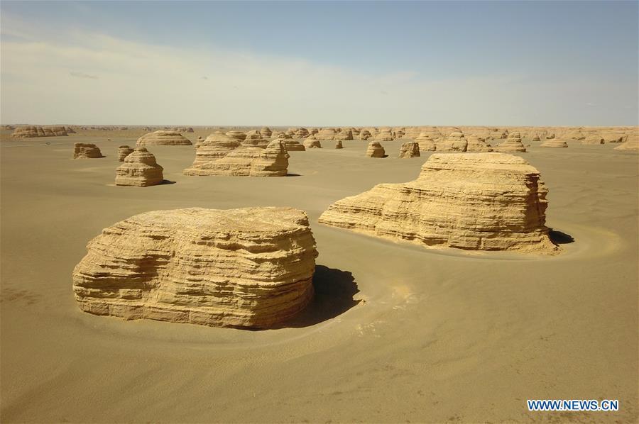 Aerial photo taken on May 8, 2019 shows the scenery of Dunhuang Yardang National Geopark after a rain in Dunhuang, northwest China\'s Gansu Province. (Xinhua/Fan Peishen)