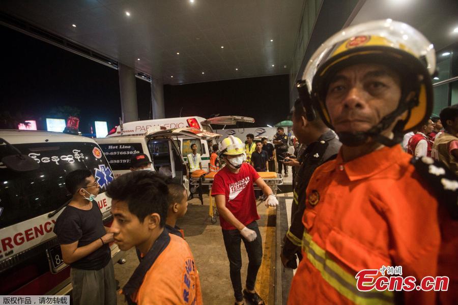 Rescuers gather at the Yangon International Airport in Yangon, Myanmar, May 8, 2019. Some 18 people including five crew members were injured after a passenger plane of the Biman Bangladesh airlines skidded off the runway at Myanmar\'s Yangon International Airport (YIA) on Wednesday, said the Department of Civil Aviation Myanmar.  (Photo/Agencies)