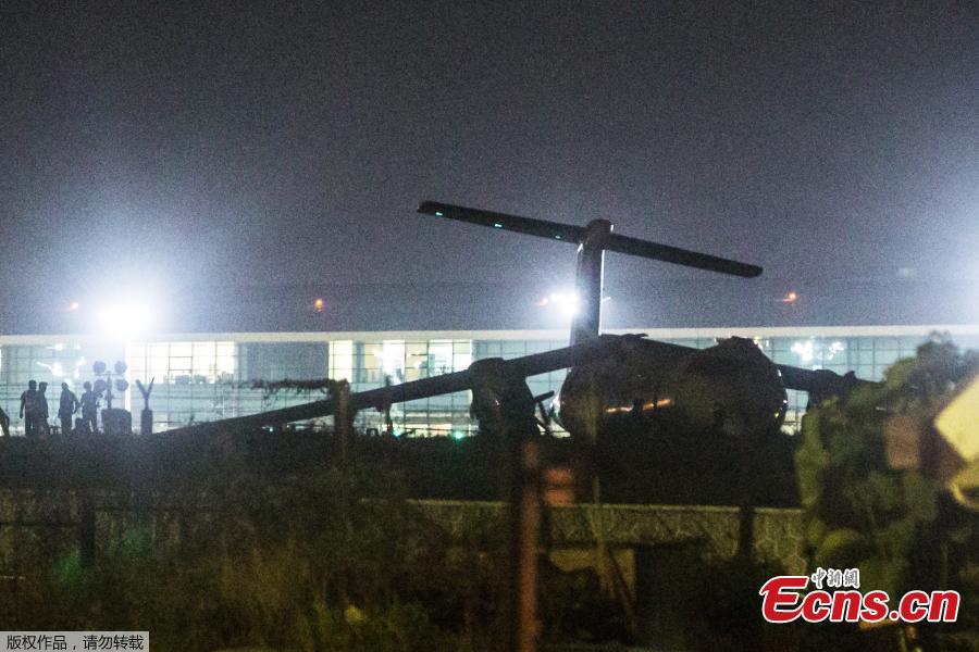 Photo taken on May 8, 2019 shows the broken passenger plane of the Biman Bangladesh airlines at the Yangon International Airport in Yangon, Myanmar. Some 18 people including five crew members were injured after a passenger plane of the Biman Bangladesh airlines skidded off the runway at Myanmar\'s Yangon International Airport (YIA) on Wednesday, said the Department of Civil Aviation Myanmar. (Photo/Agencies)