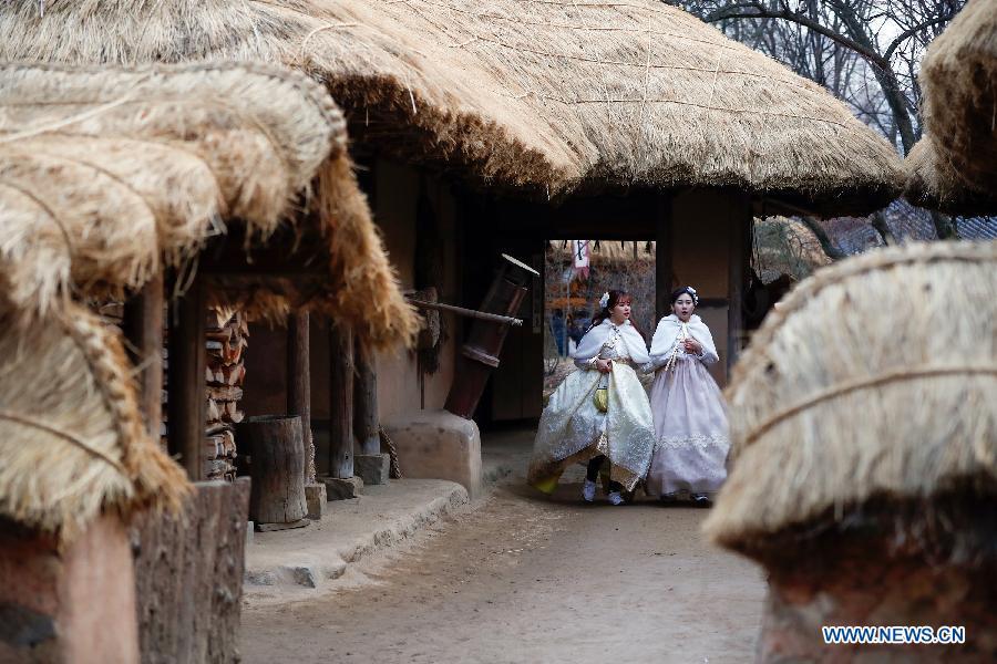 Tourists dressed in traditional costume visit a folklore-themed village in Yongin, South Korea, Feb. 5, 2019. China will hold the Conference on Dialogue of Asian Civilizations starting from May 15. Under the theme of \