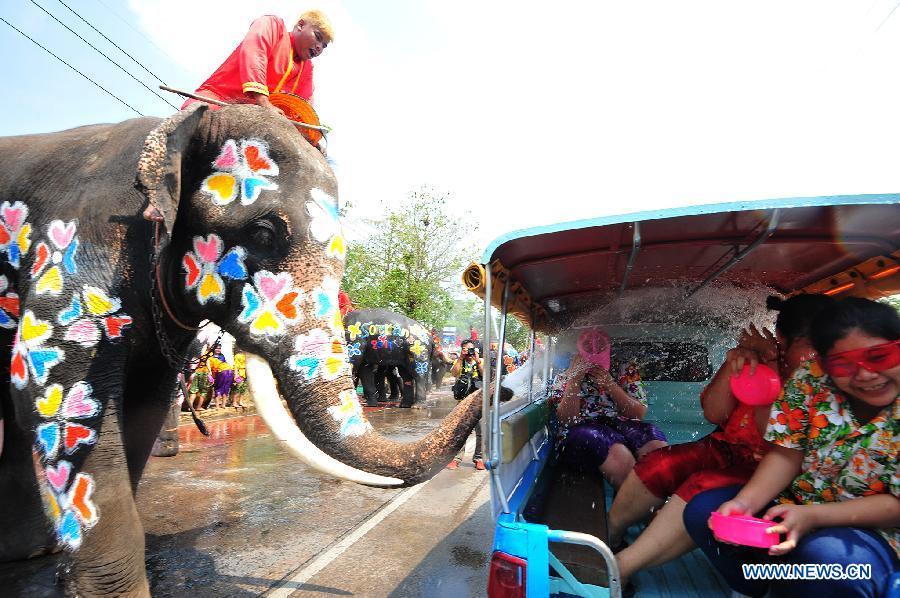 An elephant sprays water on tourists during a celebration for the Songkran festival, Thailand\'s traditional New Year Festival, in Ayutthaya, Thailand, April 11, 2019. China will hold the Conference on Dialogue of Asian Civilizations starting from May 15. Under the theme of \