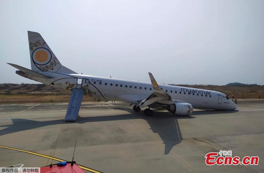 A Myanmar National Airlines flight to Mandalay International Airport makes an emergency landing without its front landing gear, May 12, 2019. No one on the plane was injured. (Photo/Agencies)