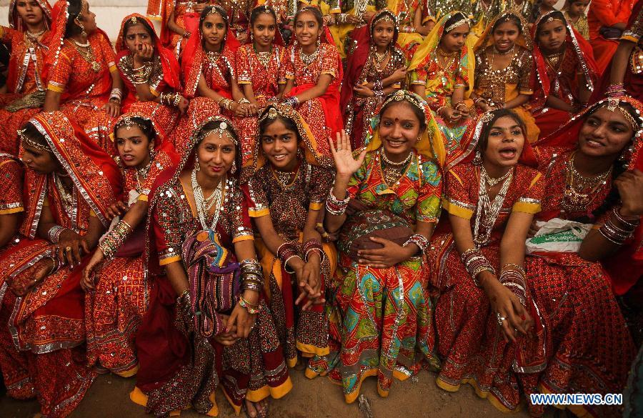 Local students take part in the opening of the Camel Fair in Pushkar of Rajasthan, India, on Oct. 31, 2014. China will hold the Conference on Dialogue of Asian Civilizations starting from May 15. Under the theme of \