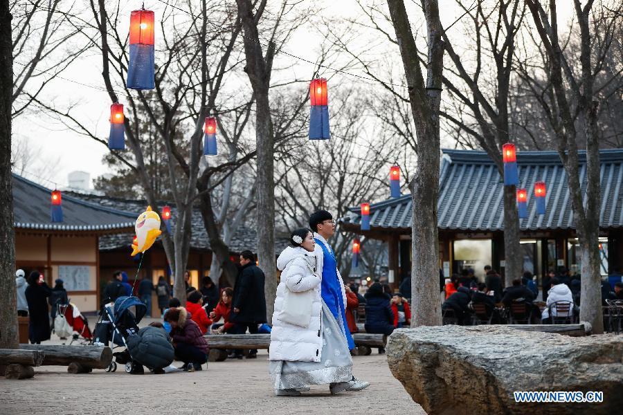 Tourists dressed in traditional costume visit a folklore-themed village in Yongin, South Korea, Feb. 5, 2019. China will hold the Conference on Dialogue of Asian Civilizations starting from May 15. Under the theme of \