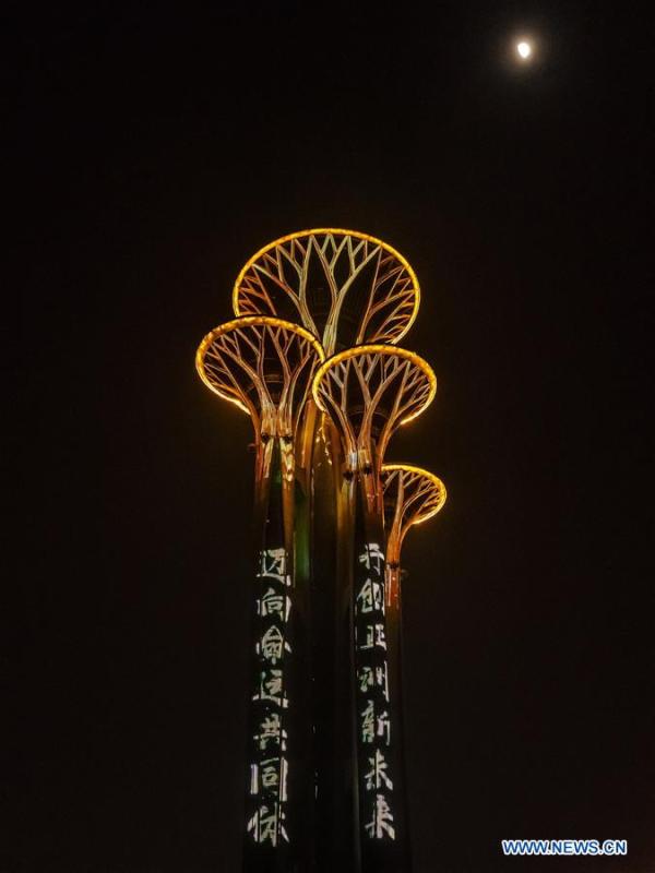 Photo taken on May 14, 2019 shows the night view of the Olympic Tower in Beijing, capital of China. Roads and buildings were illuminated Tuesday evening before the upcoming Conference on Dialogue of Asian Civilizations (CDAC) in Beijing. (Xinhua/Shen Bohan)