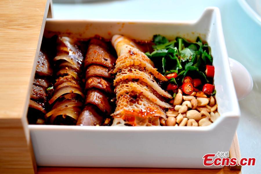Photo taken on May 14, 2019 shows the Chengdu Panda Asian Food Festival held in Chengdu City, Sichuan Province. Two hundred guests from many countries and regions were invited to enjoy the Tianfu Family Banquet that included 16 signature Sichuan dishes. Sichuan food has a long history and is known as one of the four major Chinese cuisines. The province also has the reputation of “Tian Fu Zhi Guo,” a place richly endowed with natural resources. The festival is part of the Conference on Dialogue of Asian Civilizations held in Beijing. (Photo: China News Service/An Yuan)
