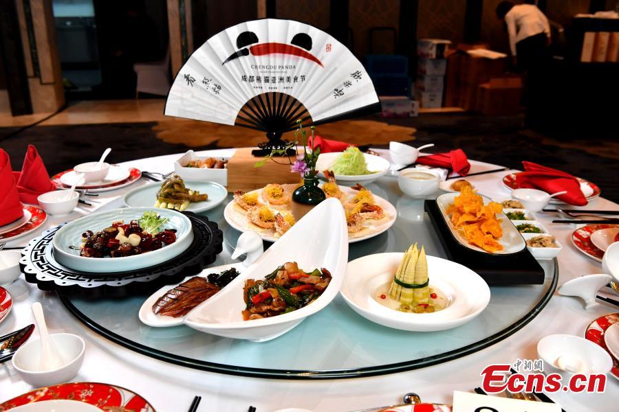 Photo taken on May 14, 2019 shows the Chengdu Panda Asian Food Festival held in Chengdu City, Sichuan Province. Two hundred guests from many countries and regions were invited to enjoy the Tianfu Family Banquet that included 16 signature Sichuan dishes. Sichuan food has a long history and is known as one of the four major Chinese cuisines. The province also has the reputation of “Tian Fu Zhi Guo,” a place richly endowed with natural resources. The festival is part of the Conference on Dialogue of Asian Civilizations held in Beijing. (Photo: China News Service/An Yuan)